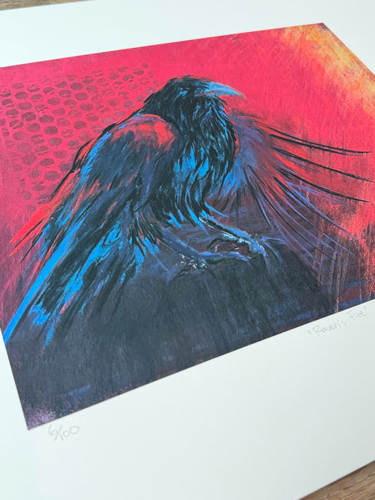 Artistic depiction of a bird in flight with red and blue colors on a textured surface. Limited Edition print of a raven painting by artist Georgia Edwards